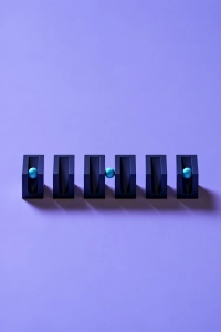 A row of six navy slots on a purple background, with blue spheres in only some of them